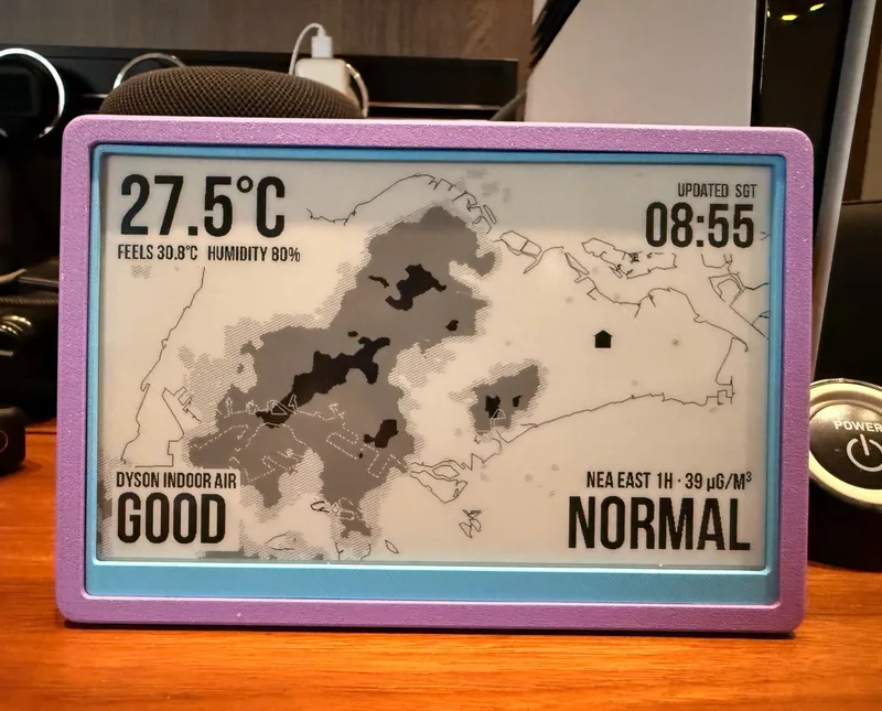 Seeed TRMNL OG e-paper display showing Singapore rain radar and indoor and outdoor air quality